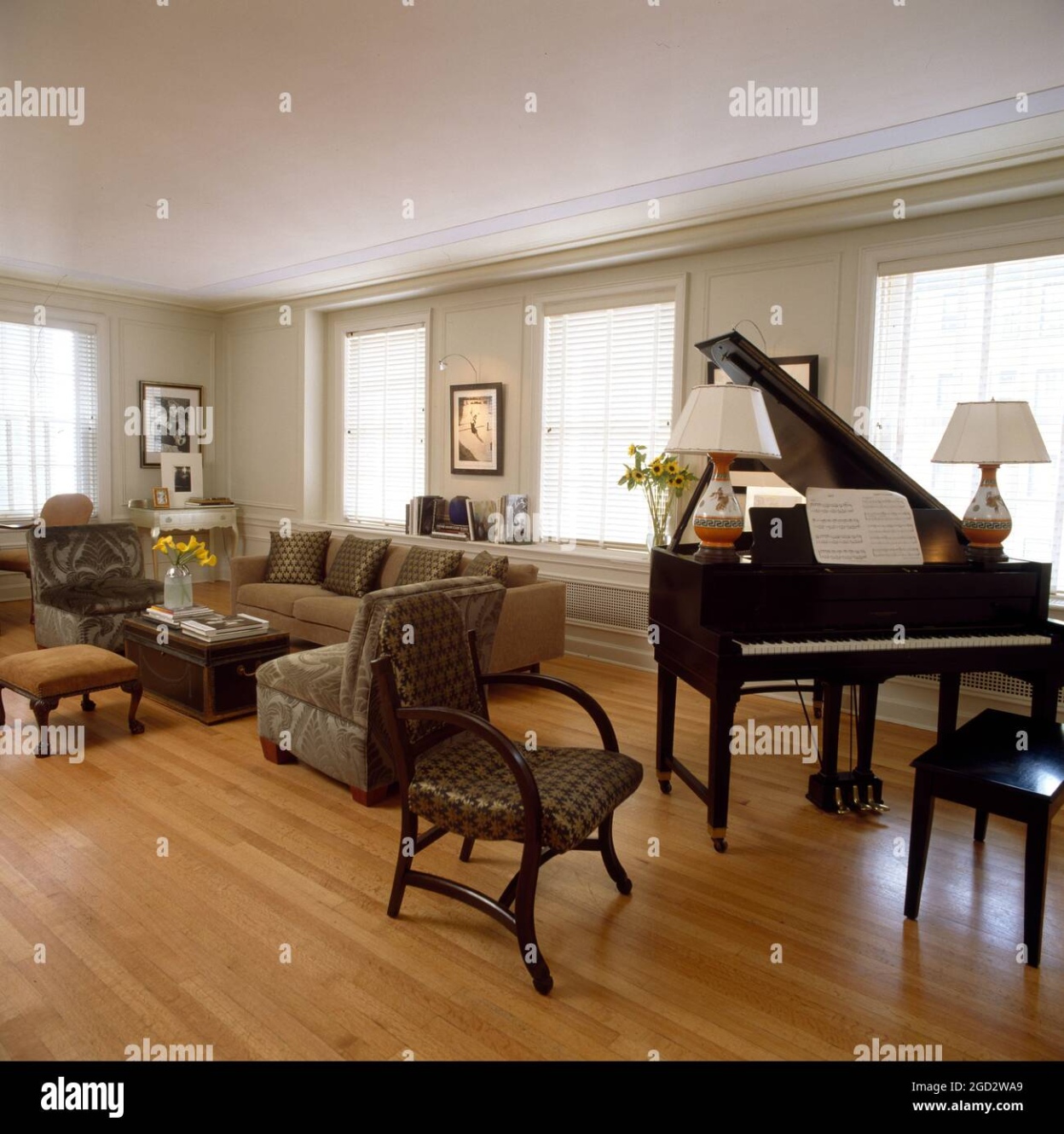 Designer livingroom in NYC with grand piano Stock Photo - Alamy